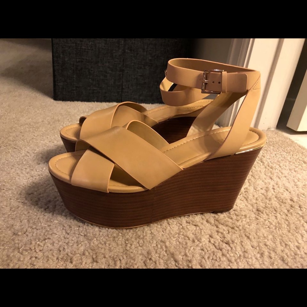 Michael Kors wedges 9.5. New. Never worn